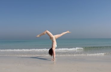 Abu Dhabi Beach Yoga Handstand